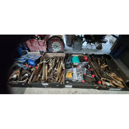 136 - 4 boxes of tools to include saws, hammers, trowels, gauging trowel, etc