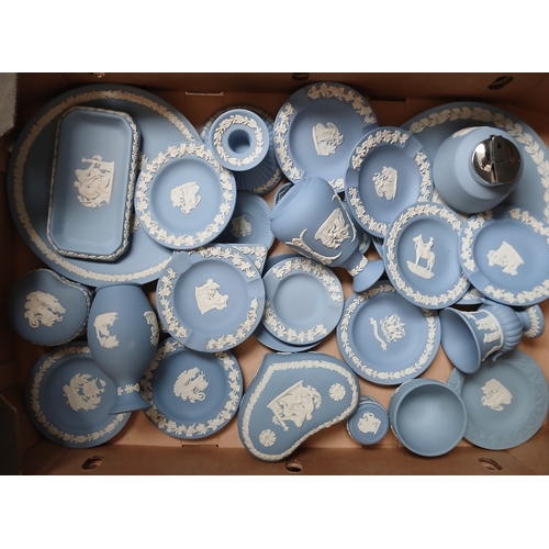 409 - A box of assorted blue Wedgwood Jasperware.