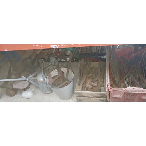 157 - 3 boxes of metalware including pickaxe heads, a box of stilsons, bucket of shoe lasts, watering cans... 