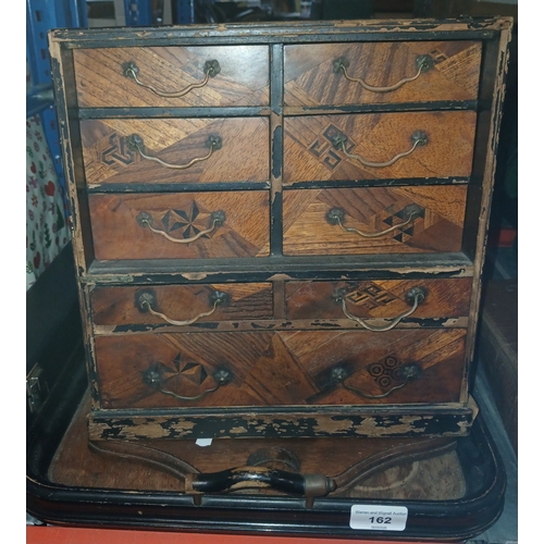 162 - A multi drawer cabinet, a spoon rack and a breakfast tray