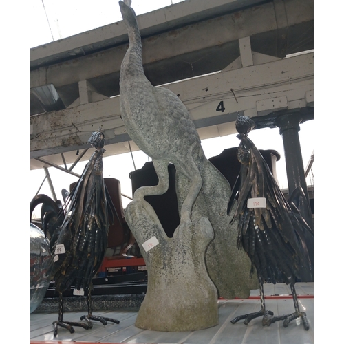 170 - A metal garden bench (in pieces),  2 metal cockerel and a metal peacock ornaments