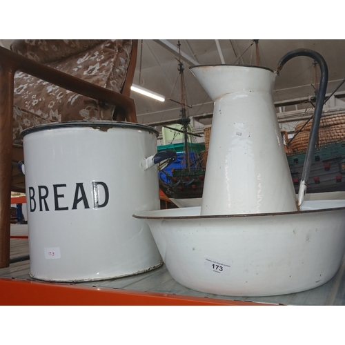 173 - An enamel bread bin and similar washbowl and jug