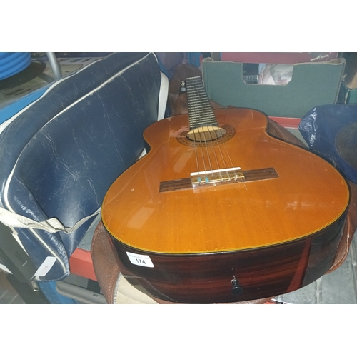 174 - A Fender Classic FC20 acoustic guitar with soft case, and a Yamaha Portasound MK100 keyboard