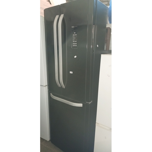 253 - A large black fridge freezer - Hotpoint Airtech Evolution