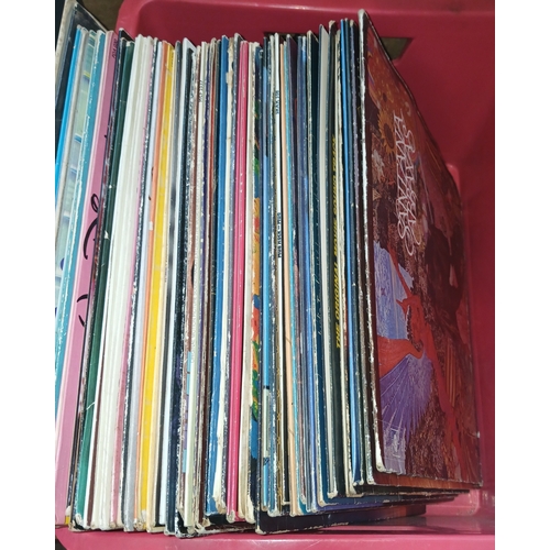 267 - A crate of LPs, 1970s & 80s, and including some Disney records. Artistes include Santana, Status Quo... 
