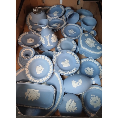 409 - A box of assorted blue Wedgwood Jasperware.