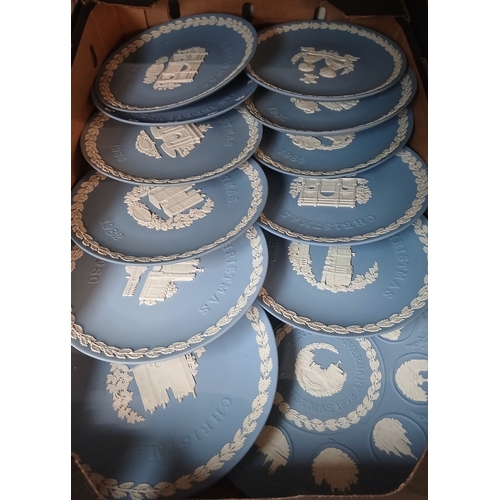410 - A box of assorted blue Wedgwood Jasperware collector plates.