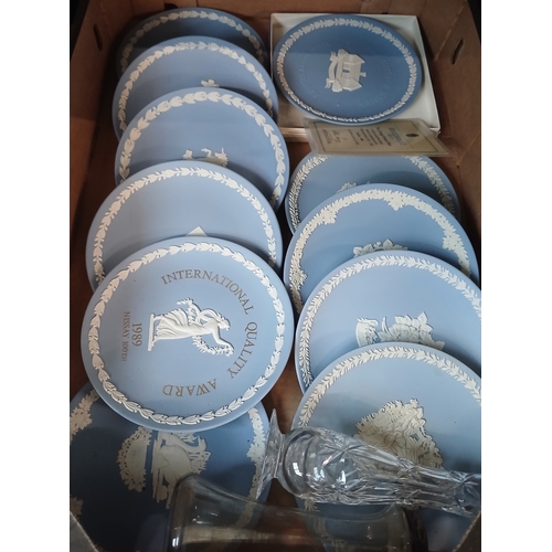 412 - A box of assorted blue Wedgwood Jasperware collector plates.