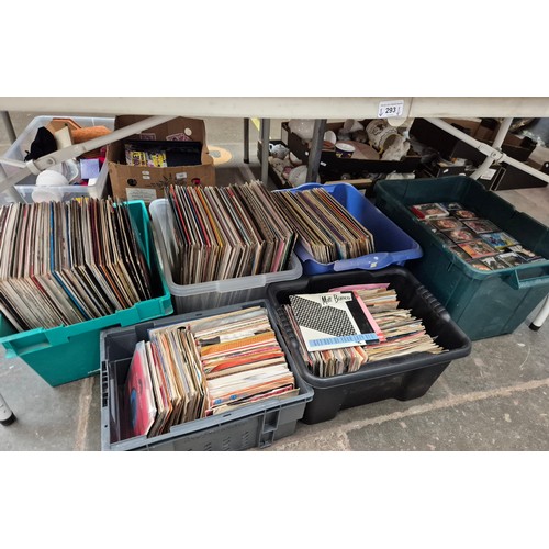 293 - 3 boxes of LPs, 2 boxes of singles, and a large box of music cassettes, unchecked. Sold as seen.