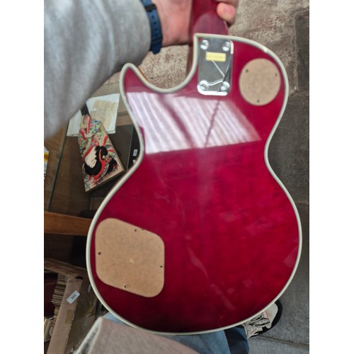 45 - A Hondo II electric guitar with a Linear Linnet Five amplifier