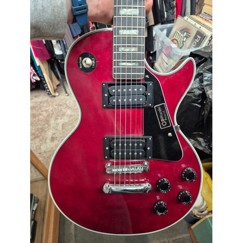 45 - A Hondo II electric guitar with a Linear Linnet Five amplifier