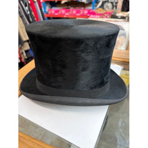 1 - A collection of 9 vintage hats to include bowlers, top hat, and ladies hats