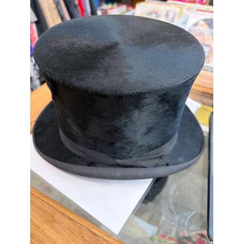1 - A collection of 9 vintage hats to include bowlers, top hat, and ladies hats