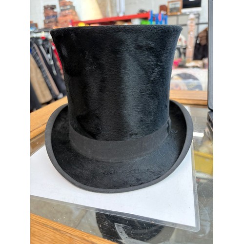 1 - A collection of 9 vintage hats to include bowlers, top hat, and ladies hats