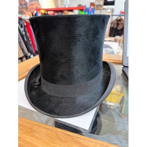 1 - A collection of 9 vintage hats to include bowlers, top hat, and ladies hats