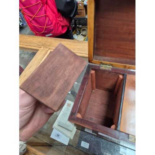 23 - An antique tea caddy with 3 section and an inlaid patera to the lid