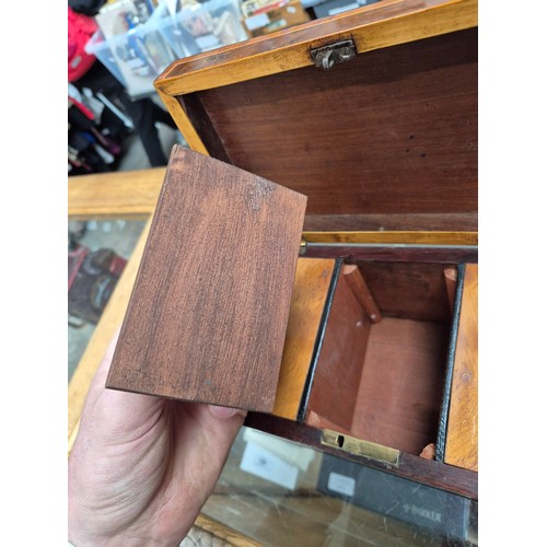23 - An antique tea caddy with 3 section and an inlaid patera to the lid