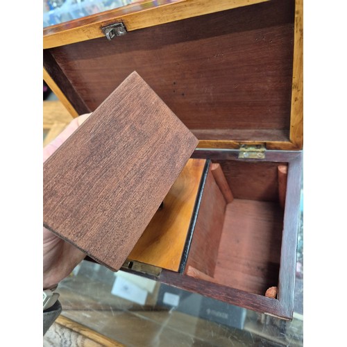 23 - An antique tea caddy with 3 section and an inlaid patera to the lid