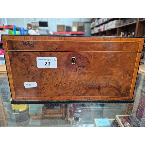 23 - An antique tea caddy with 3 section and an inlaid patera to the lid