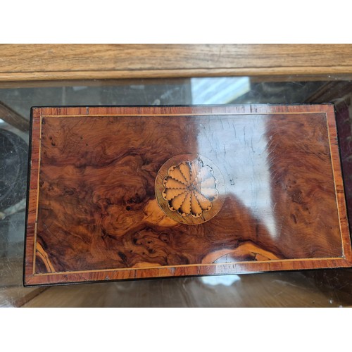 23 - An antique tea caddy with 3 section and an inlaid patera to the lid