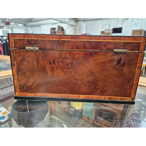 23 - An antique tea caddy with 3 section and an inlaid patera to the lid