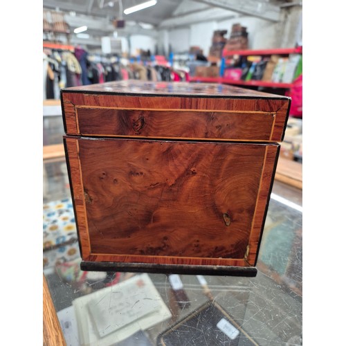 23 - An antique tea caddy with 3 section and an inlaid patera to the lid