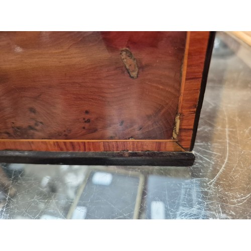 23 - An antique tea caddy with 3 section and an inlaid patera to the lid