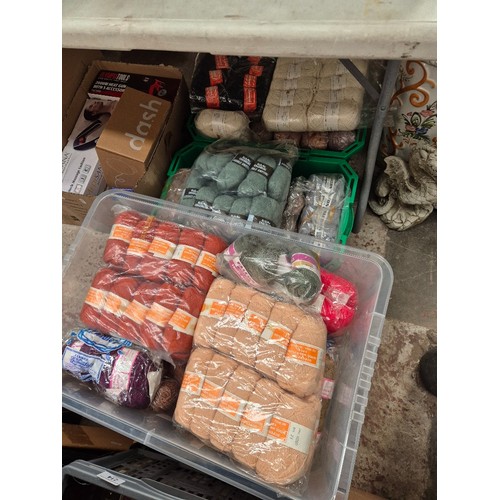 Three boxes of assorted wool.