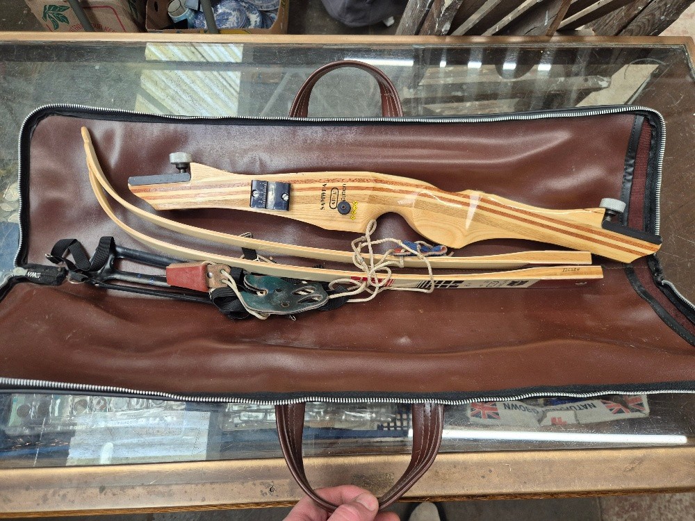 A Samwha 'Companion' breakdown laminated wood archery bow in case.