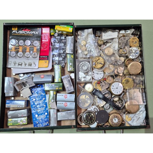 10 - A green metal four drawer filing cabinet containing watch and clock spares.