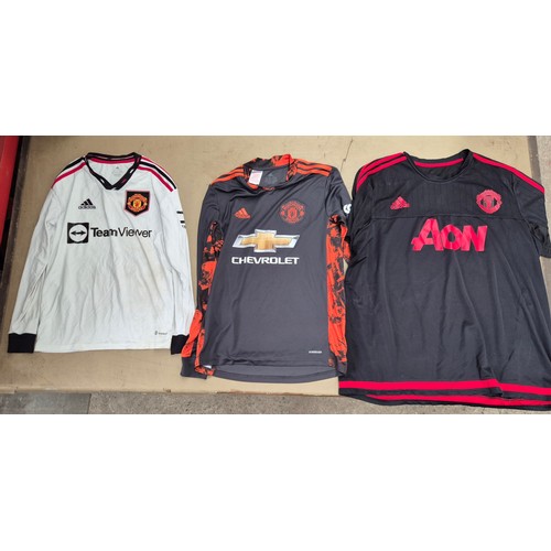 45 - A box of assorted football shirts, training tops & coats to include Manchester United, Blackburn Rov... 