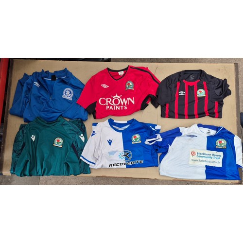 45 - A box of assorted football shirts, training tops & coats to include Manchester United, Blackburn Rov... 