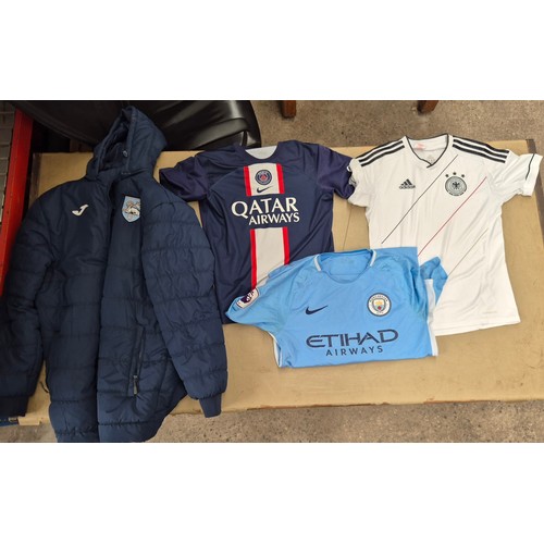 45 - A box of assorted football shirts, training tops & coats to include Manchester United, Blackburn Rov... 