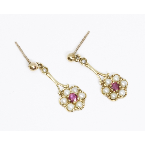 11 - A pair of 9ct gold antique style ruby and split pearl pendant earrings, hallmarked; London 1993, gro... 