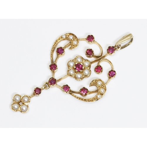 12 - A 9ct gold antique style ruby and split pearl pendant, hallmarked; sponsor 'DWT', London 1993, gross... 