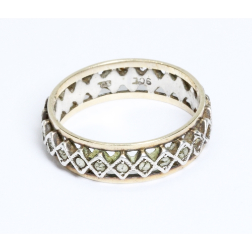 21 - A marcasite eternity band, marked '9ct', gross weight 2.4g, size M.