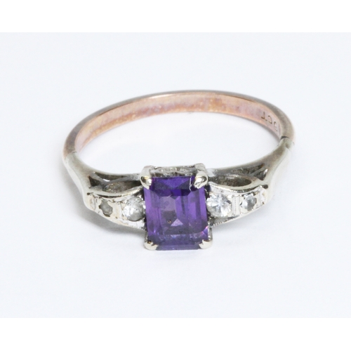 35 - An Art Deco style synthetic purple sapphire and colourless stone ring, band marked '9ct', general we... 