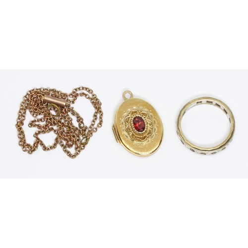 37 - A mixed lot comprising an antique chain, indistinctly marked, a garnet set locket, convention marks,... 