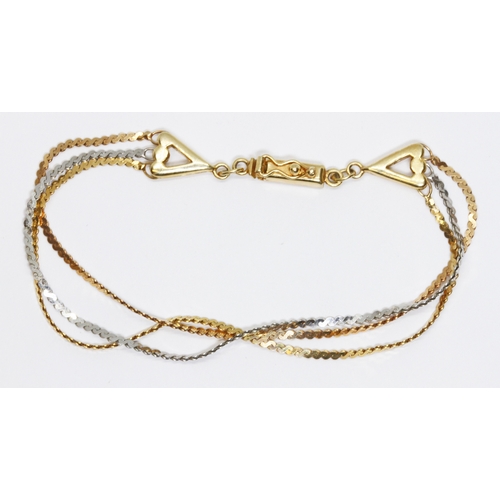 52 - A 9ct two colour gold bracelet, import marks, weight 5.6g, length 18cm.
