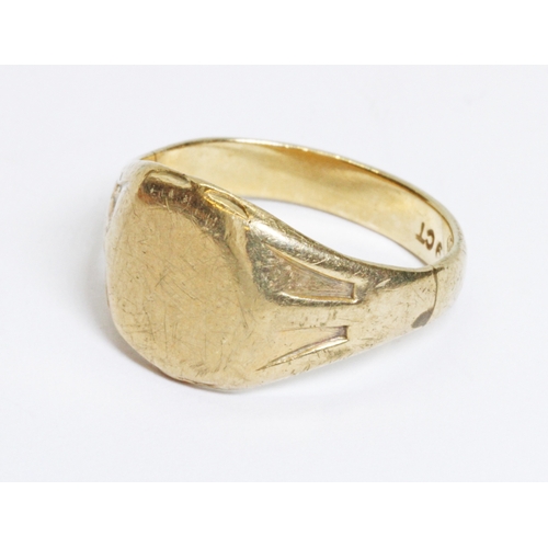 55 - A yellow metal signet ring, marked '9ct', weight 5.2g, size Q.