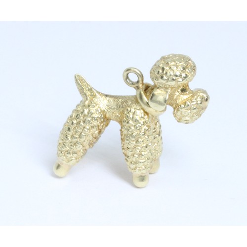 6 - A 14ct gold poodle charm, marked '.585.' with date letter 'L', further indistinct marks, weight 4.6g... 