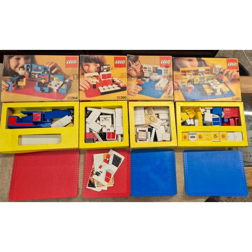 3 - Four vintage Lego sets.