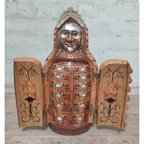 23 - John Southworth Prescott (b1939), untitled, jewellery cabinet modelled as a Russian doll, carved woo... 