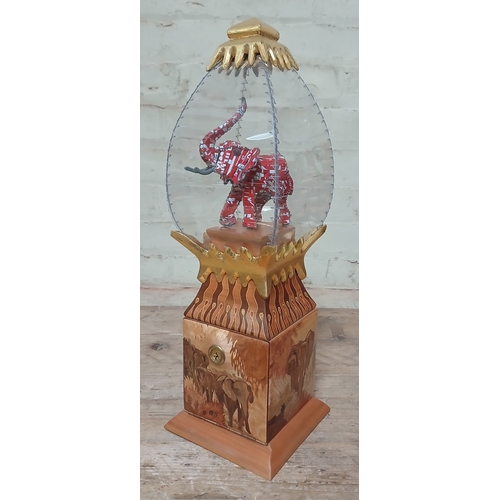 32 - John Southworth Prescott (b1939), untitled, jewellery cabinet, perspex case displaying a metal eleph... 