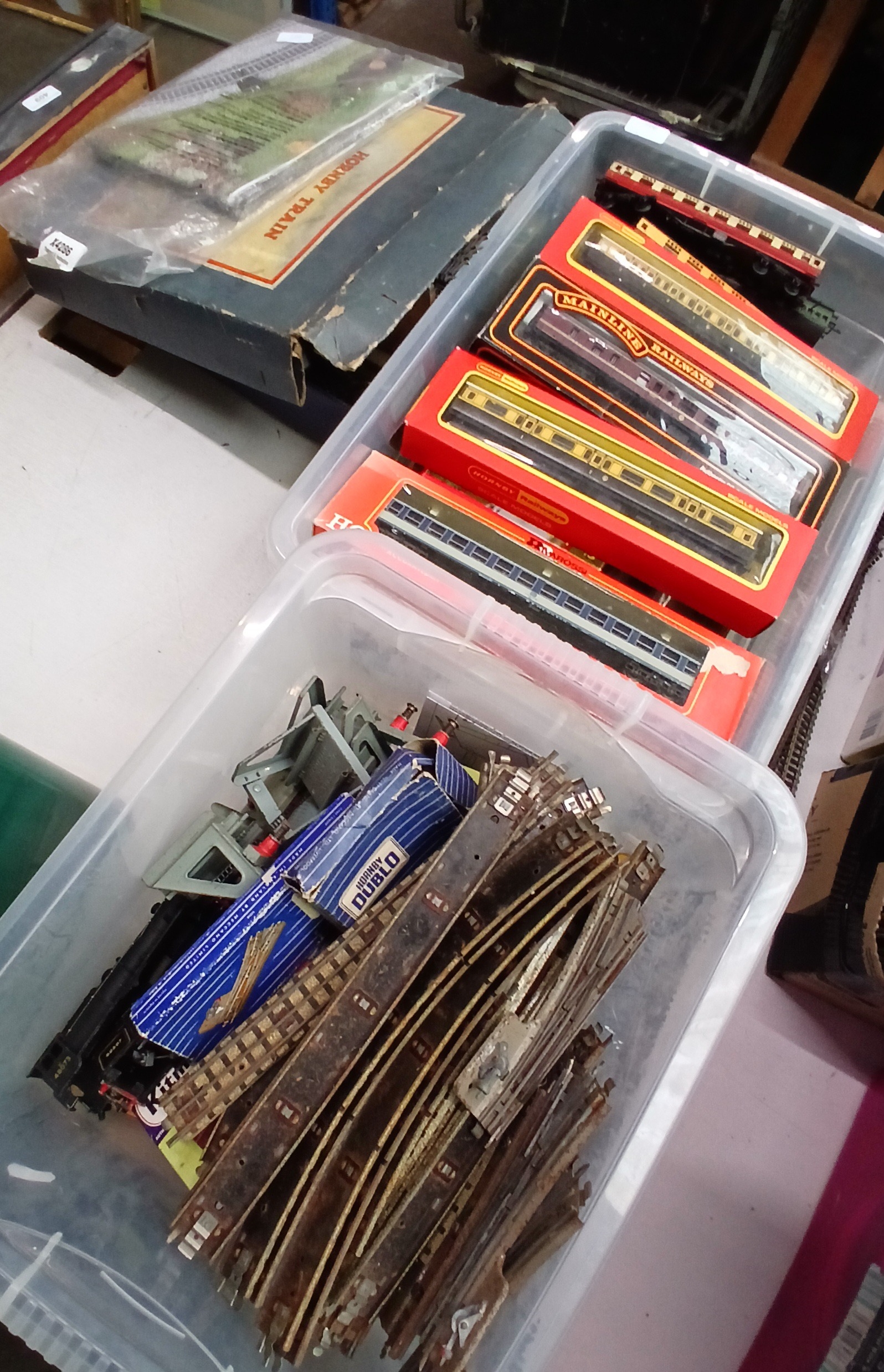 2 boxes of Hornby model railway including engine and track etc.