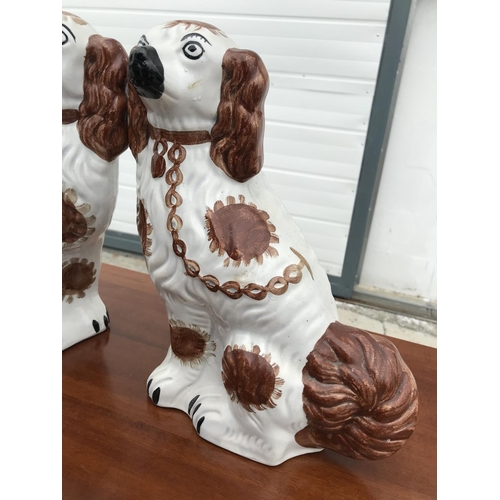 7 - Vintage Pair of Large Staffordshire Porcelain Dog Figurines (29 H. x 50 W. x 10cm D.)