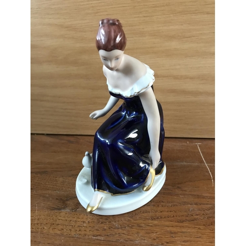 580 - Porcelain Lady Wearing Shoes Figurine