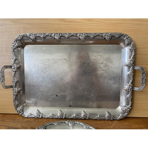 165 - x2 Large Vintage Carved Metal Serving Trays (65 x 40cm, 36cm Ø)