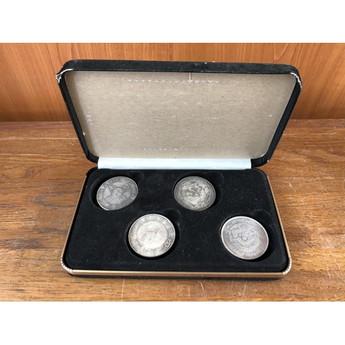 356 - Collection of 4 Good Luck Coins/Tokens in Box