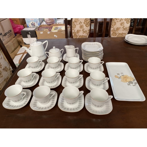 216 - Wanel 40-Piece Porcelain Tea Set